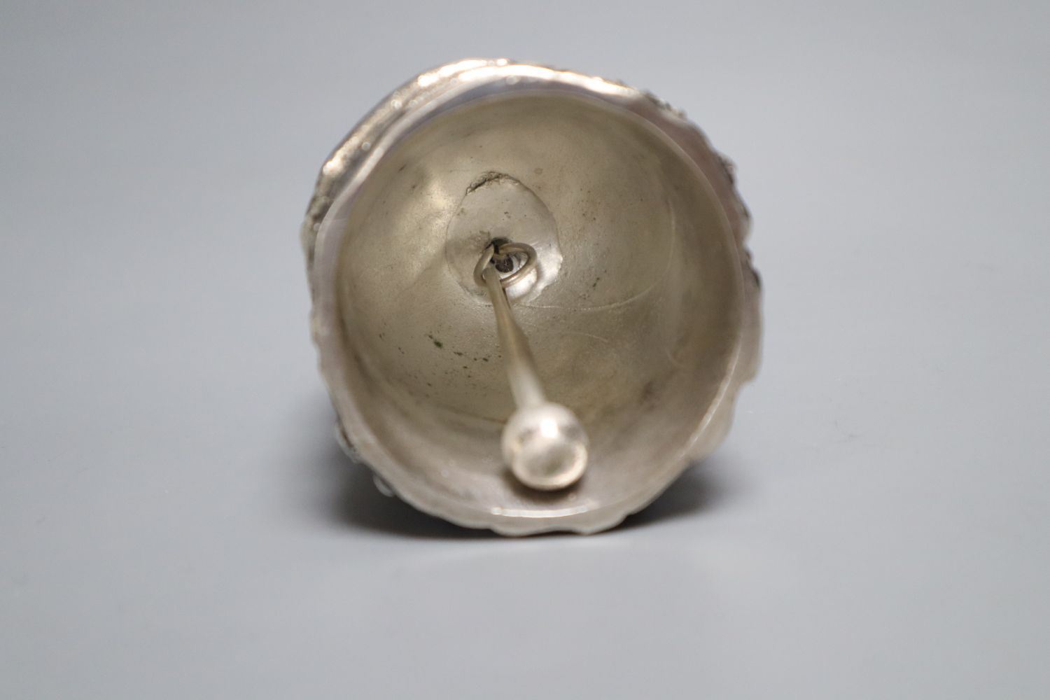 A Gorham plated figural hand bell modelled as a lady, height 13cm